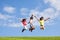 Three cute looking beautiful girls jump over sky