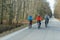 Three cyclists outside the city, spring bike ride