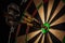 Three darts in bull\'s eye close up