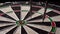 Three darts hit the dartboard. Unlucky - none of the darts hit the bull\'s eye. The concept of loss and failure