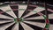 Three darts hit the dartboard. Unlucky - none of the darts hit the bull\'s eye. The concept of loss and failure