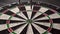 Three darts hit the dartboard. Unlucky - none of the darts hit the bull\'s eye. The concept of loss and failure