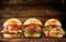 Three delicious chicken, beef and seafood burgers