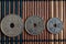 Three Denmark coins denomination is 5, 2 and 1 krone (crown) - back side lie on wooden bamboo table, good for background or postca