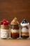 Three dessert jars filled with delicious treats