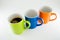 Three diagonal mugs with coffee mug in the center