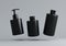 Three different black plastic cosmetic product floating bottles set template on gray background 3D render