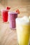 Three different Fruit shakes, watermelon,pinapple and mixed berry