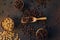 three different varieties of fresh roasted coffee beans in woden bowls