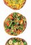 Three different vegan pizza on a white background