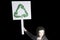 Three-dimensional 3D illustration woman representing environmental responsibility carries the announcement of the renewable symbol