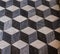 The three-dimensional effect f a marble cube floor in a church
