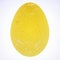 three-dimensional yellow egg with textured shell on a white background. 3d render