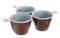 Three disposable plastic brown coffee cups