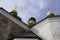 Three domes with three golden orthodox crosses on the roof of the temple