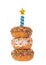 Three donuts stacked with candle