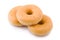 Three doughnuts or donuts piled