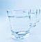 Three drink glasses with water, nutrition and health-care concept