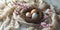 Three eggs in a nest with pink flowers, natural traditional Easter decor