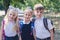 Three elementary school students with backpacks