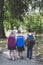 Three elementary school students with backpacks