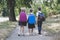 Three elementary school students with backpacks