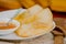 Three empanadas nicely arranged on white platter