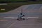 Three engined private jet taxiing to the terminal