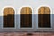 Three equal antique windows-doors, concept - make your choice with different outputs