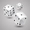 Three falling white game dice. Casino gambling