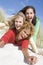 Three female friends having fun at beach