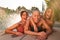 Three Female Friends Outdoors Splashing In Swimming Pool And Enjoying Summer Party