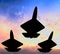 Three fighter jets in formation