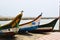 Three fishermen boats on the beach.