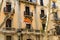 Three Flags on Old Barcelona Apartment Building