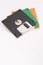 Three floppy disks on white background. Copy space below for text.