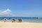 Three folding beach chairs on the beach with sea and bright sky in the background at Koh Mak in Trat, Thailand. Seasonal Vacation