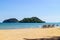 Three folding beach chairs on the beach with sea, bright sky in the background at Koh Mak in Trat, Thailand. Seasonal Vacation.