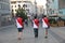 Three football fans in t-shirts with the inscription Egypt and the number ten