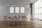 Three frames on grey wall of dining room with pink details