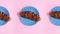 Three fresh delicious croissants move on blue plate on pink theme. Stop motion