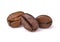 Three fresh roasted dark brown arabica coffee beans isolated on a white background with clipping path