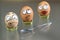 Three frightened egg faces
