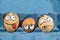 Three frightened egg faces