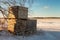 Three Frosty Crates On A Snowy Field