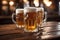 Three full beer mugs on a rustic wooden table