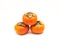 Three Fuyu persimmon isolated