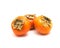 Three Fuyu persimmon isolated