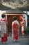 Three Geisha in a street of Kyoto