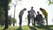 Three generation asian family enjoying outdoor activity in park